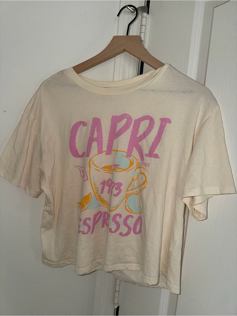 Rebellious One Cream Capri Espresso Graphic Crop Tee with Pink and Yellow Print